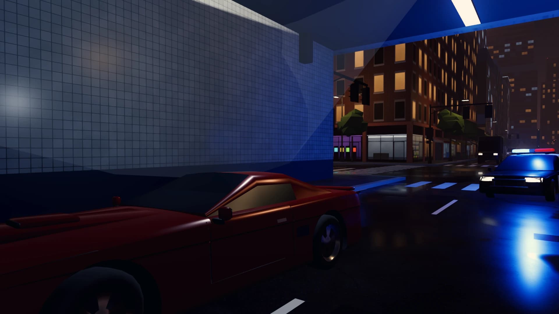 The red car leaves a tunnel mouth with blue police lights in the rain behind it